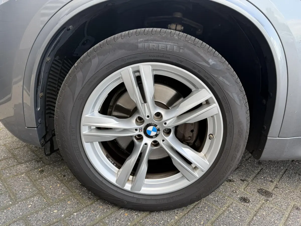 xDrive40e iPerformance High Executive M-Sport | Navigatie | Parkeersensoren | Sportstoelen | Stoelverwarming |