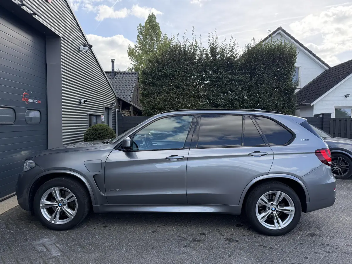 xDrive40e iPerformance High Executive M-Sport | Navigatie | Parkeersensoren | Sportstoelen | Stoelverwarming |