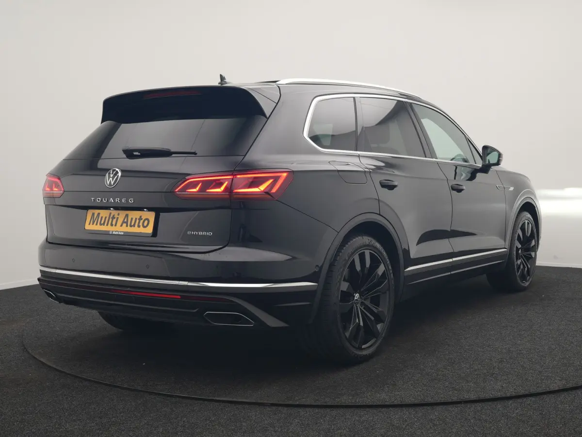 3.0 TSi eHybrid 4MOTION PHEV 381pk Dealer O.H | Luchtvering | Trekhaak Af Fabriek | Panodak | Adaptive Cruise | Matrix LED | Lederen Sportstoelen Memory & Verwarmd | Keyless | Apple Carplay 