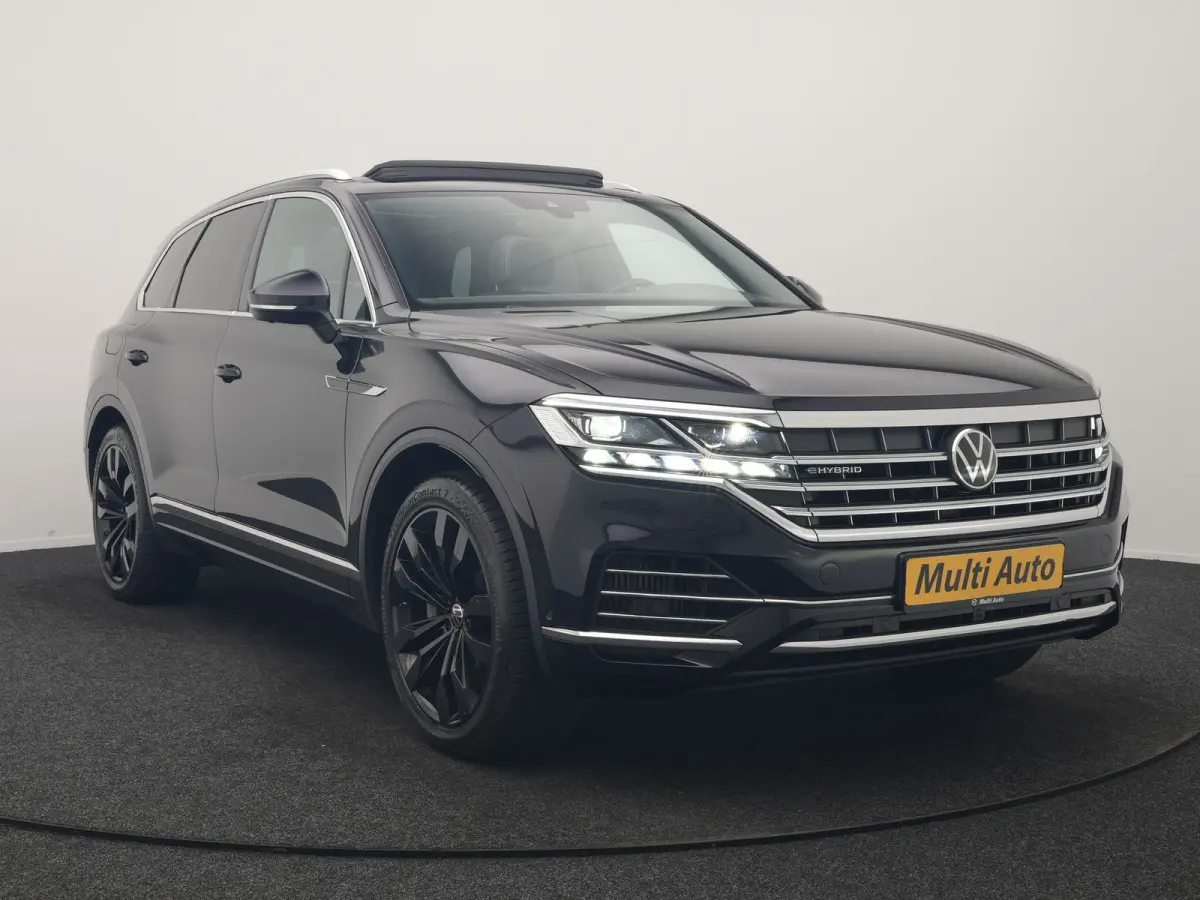3.0 TSi eHybrid 4MOTION PHEV 381pk Dealer O.H | Luchtvering | Trekhaak Af Fabriek | Panodak | Adaptive Cruise | Matrix LED | Lederen Sportstoelen Memory & Verwarmd | Keyless | Apple Carplay 
