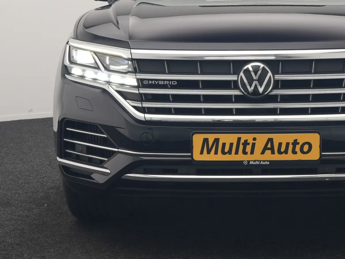 3.0 TSi eHybrid 4MOTION PHEV 381pk Dealer O.H | Luchtvering | Trekhaak Af Fabriek | Panodak | Adaptive Cruise | Matrix LED | Lederen Sportstoelen Memory & Verwarmd | Keyless | Apple Carplay 
