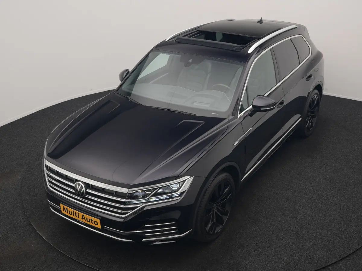 3.0 TSi eHybrid 4MOTION PHEV 381pk Dealer O.H | Luchtvering | Trekhaak Af Fabriek | Panodak | Adaptive Cruise | Matrix LED | Lederen Sportstoelen Memory & Verwarmd | Keyless | Apple Carplay 