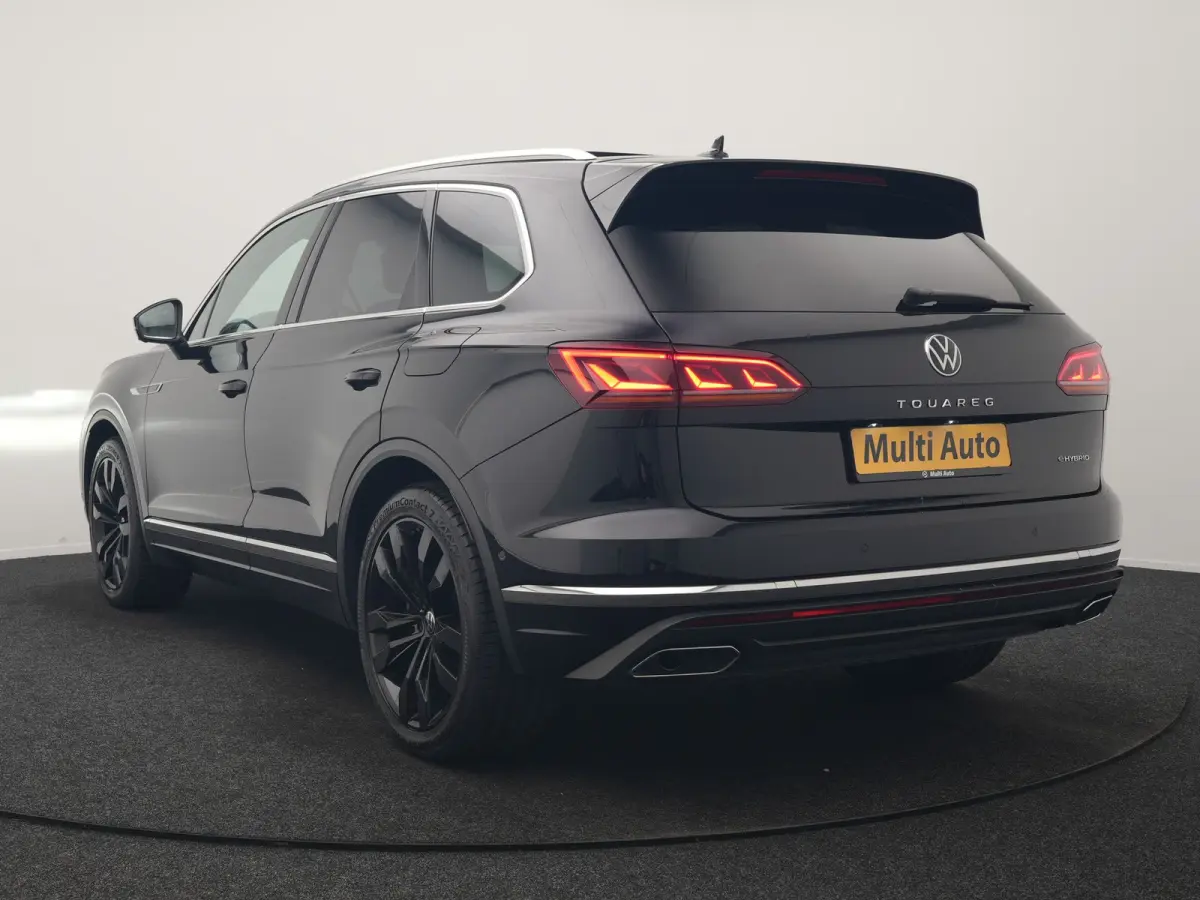 3.0 TSi eHybrid 4MOTION PHEV 381pk Dealer O.H | Luchtvering | Trekhaak Af Fabriek | Panodak | Adaptive Cruise | Matrix LED | Lederen Sportstoelen Memory & Verwarmd | Keyless | Apple Carplay 