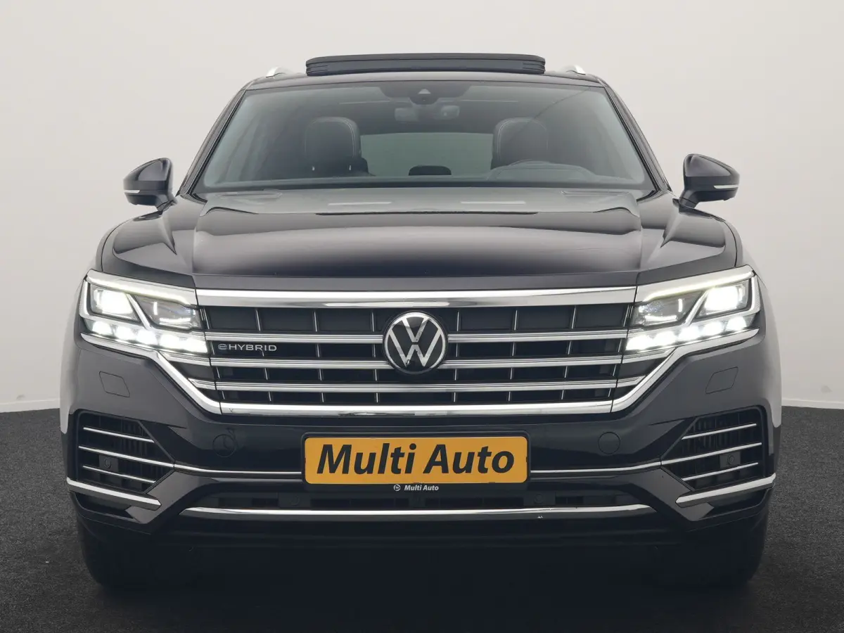 3.0 TSi eHybrid 4MOTION PHEV 381pk Dealer O.H | Luchtvering | Trekhaak Af Fabriek | Panodak | Adaptive Cruise | Matrix LED | Lederen Sportstoelen Memory & Verwarmd | Keyless | Apple Carplay 