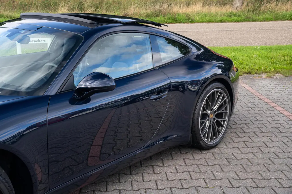 991.2 3.0 Carrera 991.2 PDK | Org. NL | 2 eig. | BOSE | Sport Chrono | Panoramadak | Sportuitlaat | SportDesign | Dealer Onderhouden