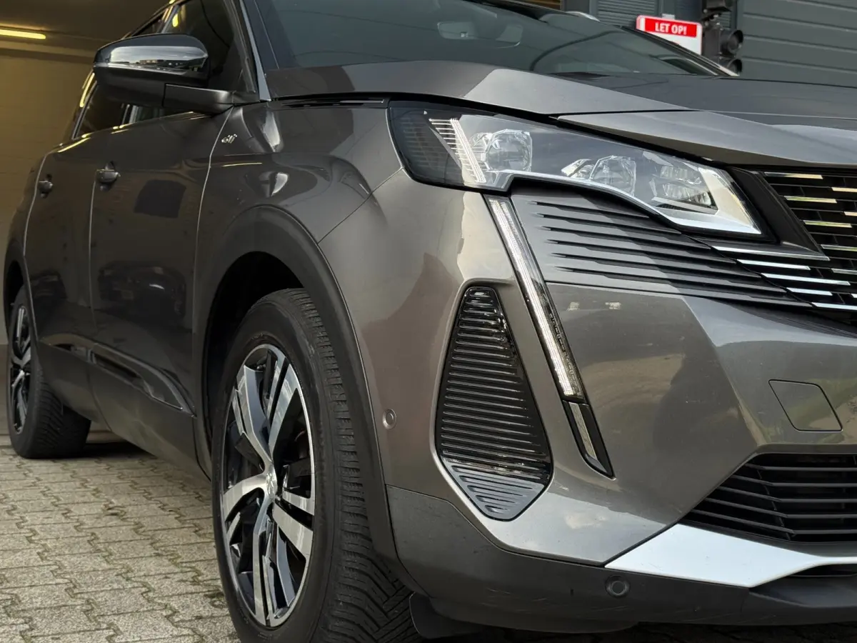 1.2 PureTech GT / NWE DISTR.RIEM !! / 7-ZITTER / ADAPTIEVE CRUISE / AFN. TREKHAAK / CAMERA / CARPLAY / KEYLESS / '18!
