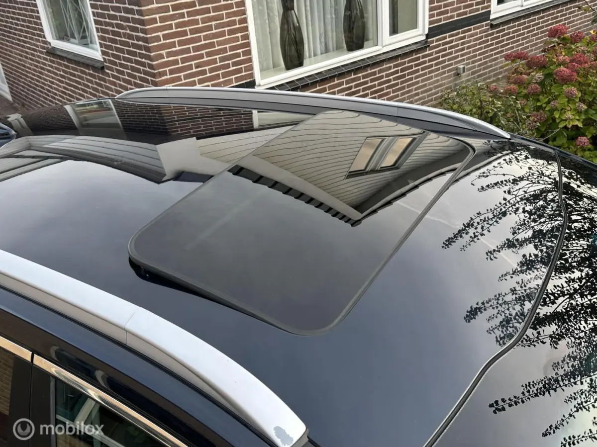 ExecutiveLine 64 kWh 3-FASE SOH 98,6% WARMTEPOMP SCHUIFDAK LEDER CARPLAY STOELVENTILATIE/VERWARMING ACHTERUITRIJ CAMERA!!