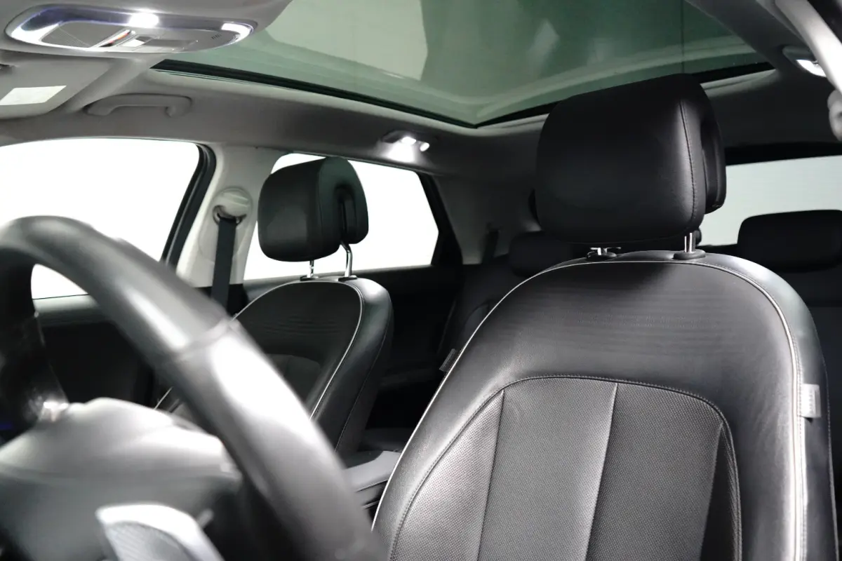 Connect 77,4 kWh | SOH 100% / Elektrische achterklep / Rondomzicht camera / Warmtepomp / Climate control / Stuur- Stoel & Achterbank verwarming / Adaptief cruise control / | Achteruitrijcame