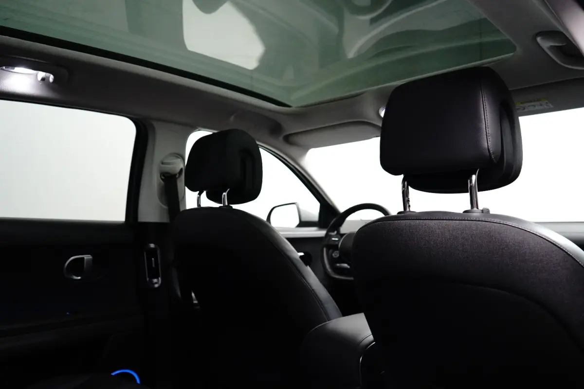 Connect 77,4 kWh | SOH 100% / Elektrische achterklep / Rondomzicht camera / Warmtepomp / Climate control / Stuur- Stoel & Achterbank verwarming / Adaptief cruise control / | Achteruitrijcame