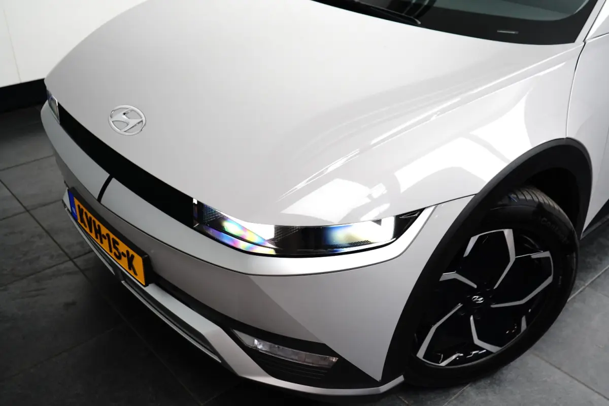 Connect 77,4 kWh | SOH 100% / Elektrische achterklep / Rondomzicht camera / Warmtepomp / Climate control / Stuur- Stoel & Achterbank verwarming / Adaptief cruise control / | Achteruitrijcame