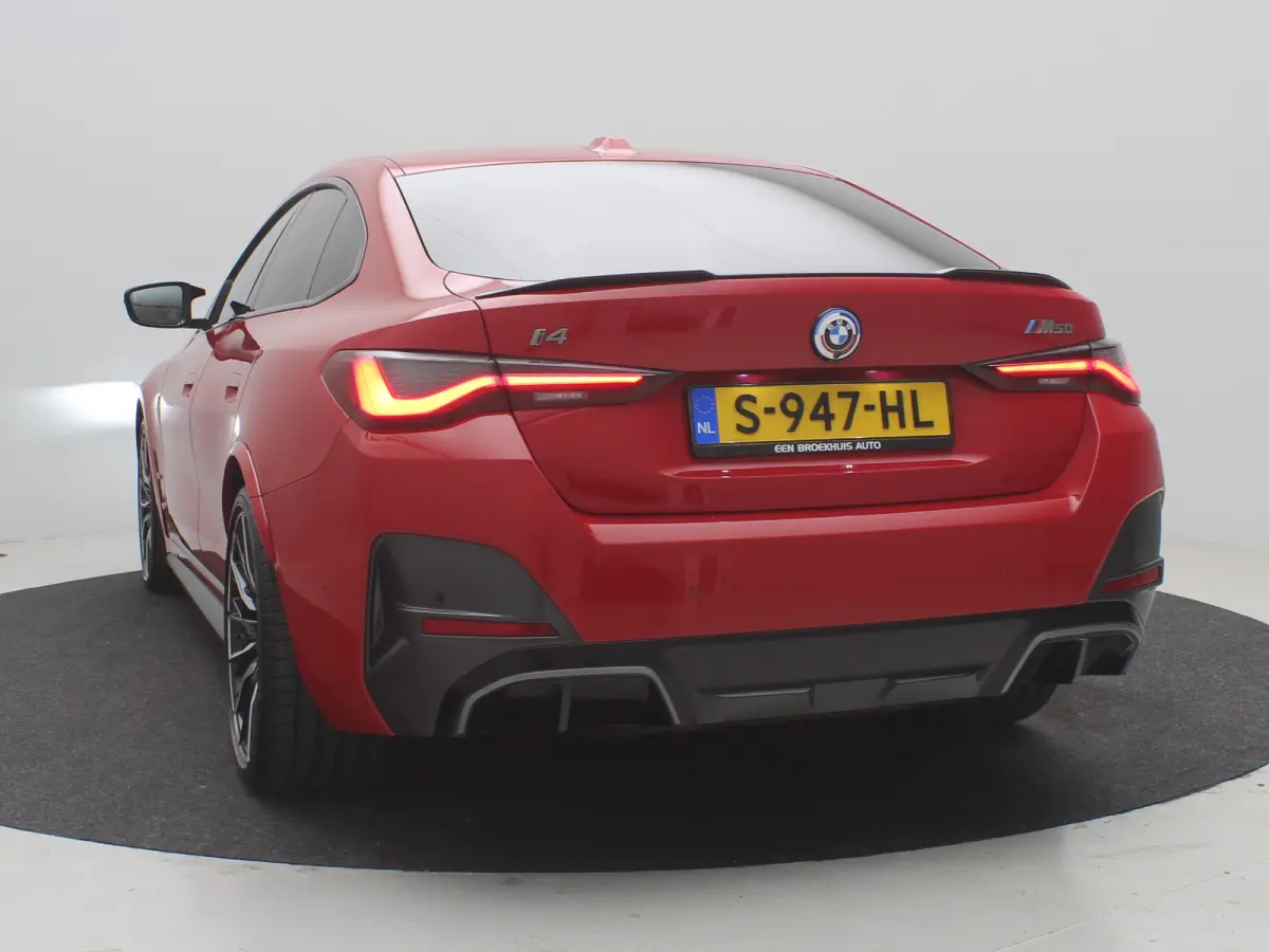 M50 High Executive 84 kWh / AWD / 544PK / 450 km WLTP / Warmtepomp / 3 Fase laden / M-Performance pakket / Harman Kardon / Full Option / Historie aanwezig /