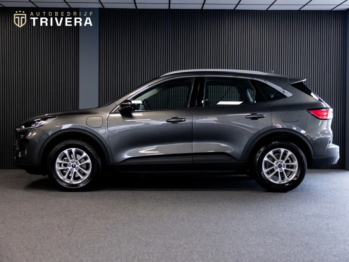2.5 PHEV Titanium l SoH 96% l CAM 360° l CARPLAY l NAV l 1ste eig.l Keyless entry l Dealer Onderh.l Virtual cockpit
