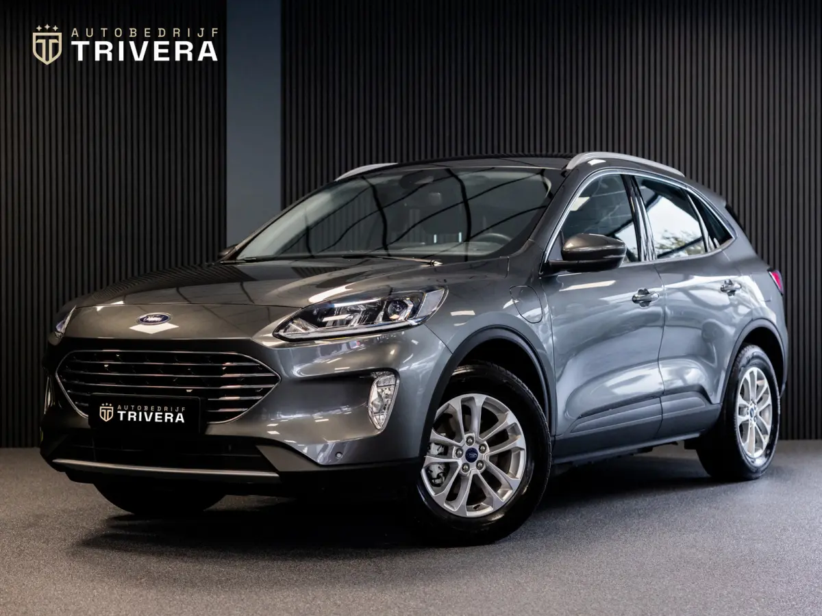 2.5 PHEV Titanium l SoH 96% l CAM 360° l CARPLAY l NAV l 1ste eig.l Keyless entry l Dealer Onderh.l Virtual cockpit