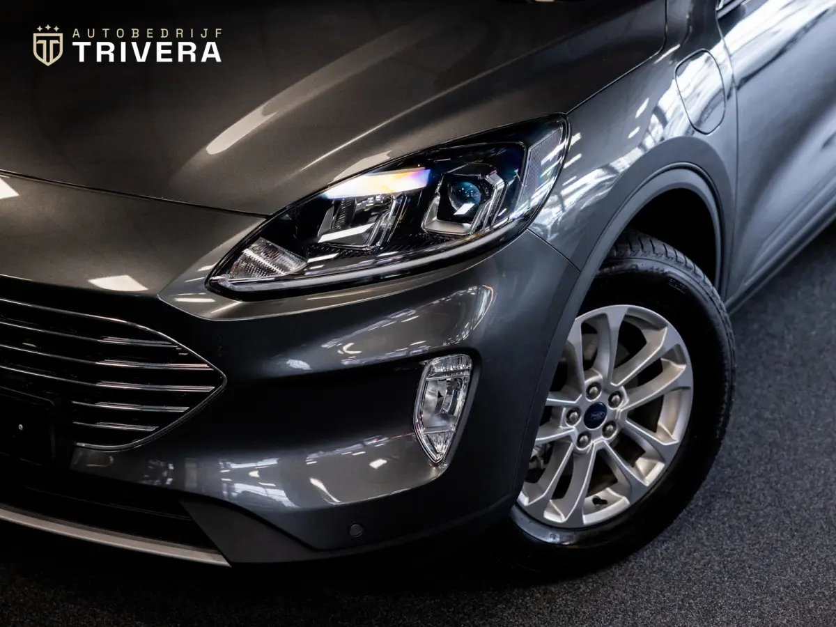 2.5 PHEV Titanium l SoH 96% l CAM 360° l CARPLAY l NAV l 1ste eig.l Keyless entry l Dealer Onderh.l Virtual cockpit