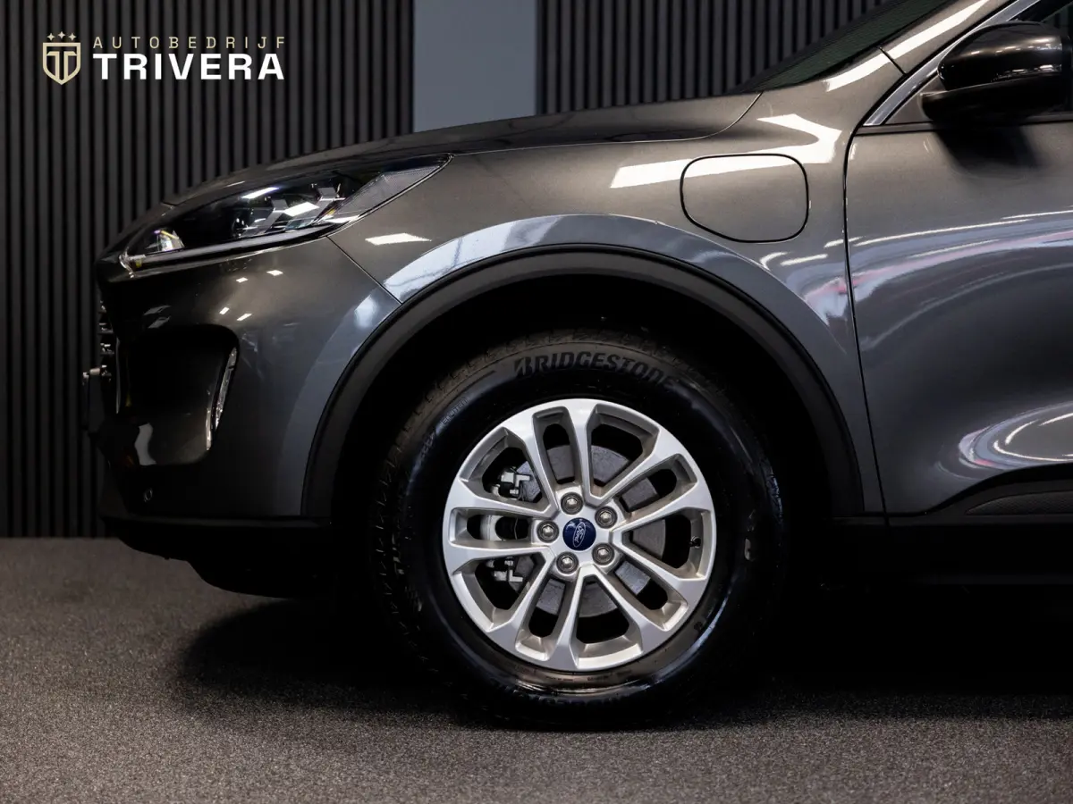 2.5 PHEV Titanium l SoH 96% l CAM 360° l CARPLAY l NAV l 1ste eig.l Keyless entry l Dealer Onderh.l Virtual cockpit