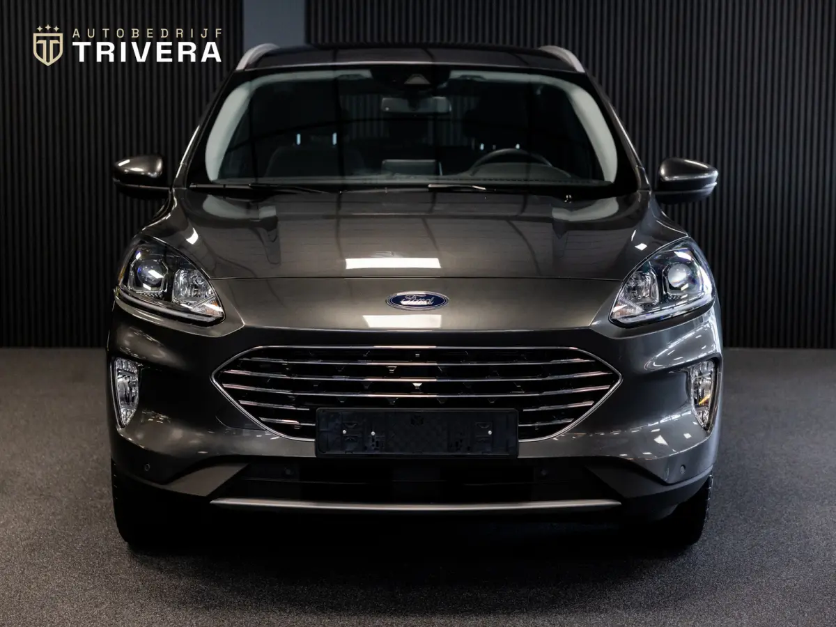 2.5 PHEV Titanium l SoH 96% l CAM 360° l CARPLAY l NAV l 1ste eig.l Keyless entry l Dealer Onderh.l Virtual cockpit