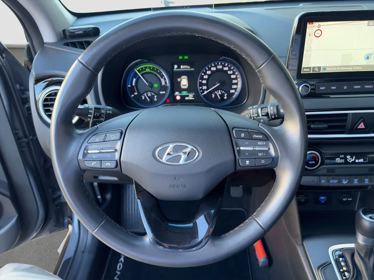 1.6 GDI HEV 141pk Fashion | Premium Audio | Trekhaak | Side Steps | Schuifdak | Climate controle | Dodehoek detectie | Head-up display | Navigatie | Keyless entry | Adaptive cruise controle