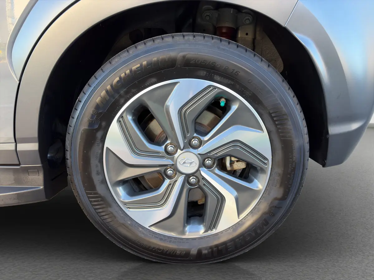 1.6 GDI HEV 141pk Fashion | Premium Audio | Trekhaak | Side Steps | Schuifdak | Climate controle | Dodehoek detectie | Head-up display | Navigatie | Keyless entry | Adaptive cruise controle