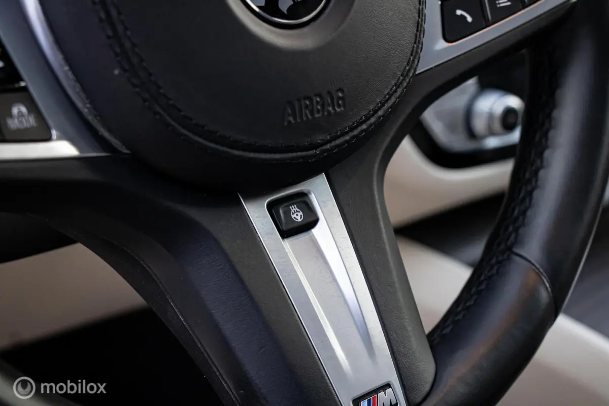 530e xDrive High Executive M-Sport Tanzanite