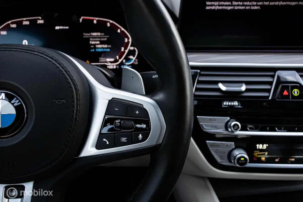 530e xDrive High Executive M-Sport Tanzanite