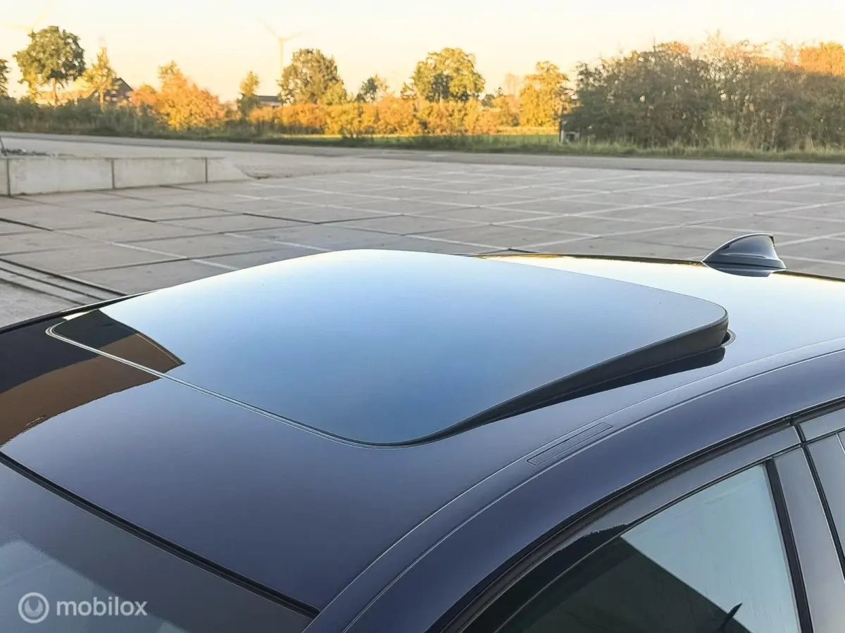 530e xDrive High Executive M-Sport Tanzanite