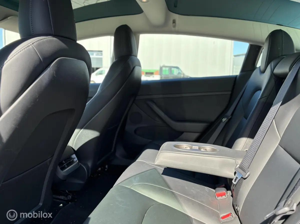 Long Range AWD 75 kWh | Warmtepomp | SOH 90,8% | 351 pk | Zwart