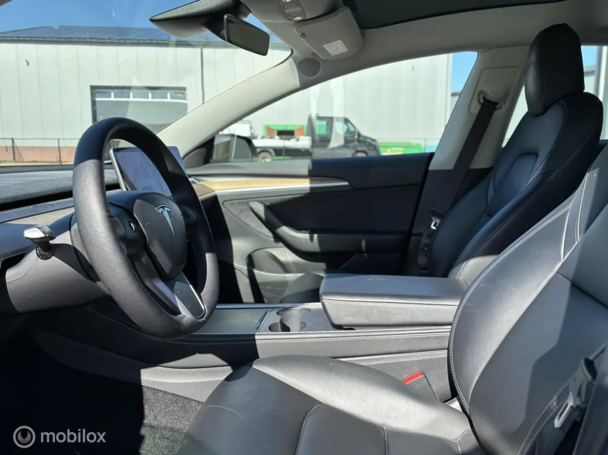 Long Range AWD 75 kWh | Warmtepomp | SOH 90,8% | 351 pk | Zwart