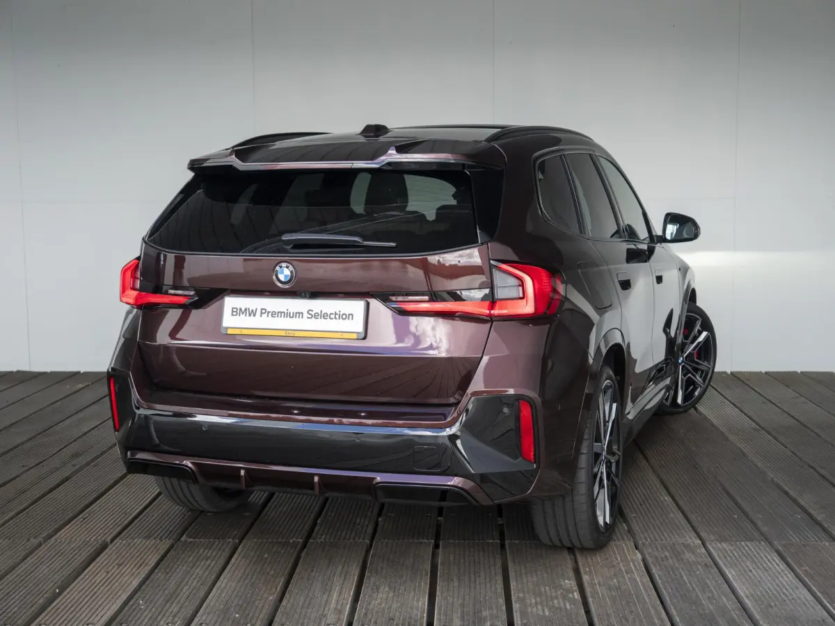 eDrive20 | M Sportpakket Pro | Comfort Access | Panoramadak | Harman Kardon | Voorstoelen verwarmd | 21 inch