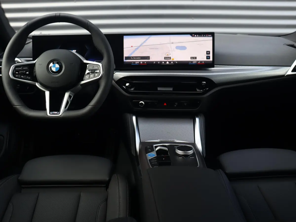 eDrive40 | M Sportpakket Pro | Comfort Access | Getint Glas | Hi-Fi | Adaptive Cruise Control | Laserlight | Stuurwiel Verwarmd | SoH 100% | 19'' LMV