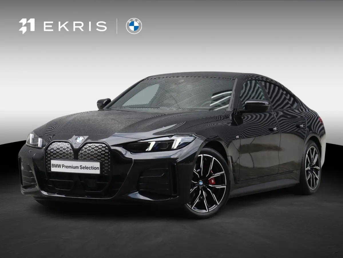 eDrive40 | M Sportpakket Pro | Comfort Access | Getint Glas | Hi-Fi | Adaptive Cruise Control | Laserlight | Stuurwiel Verwarmd | SoH 100% | 19'' LMV