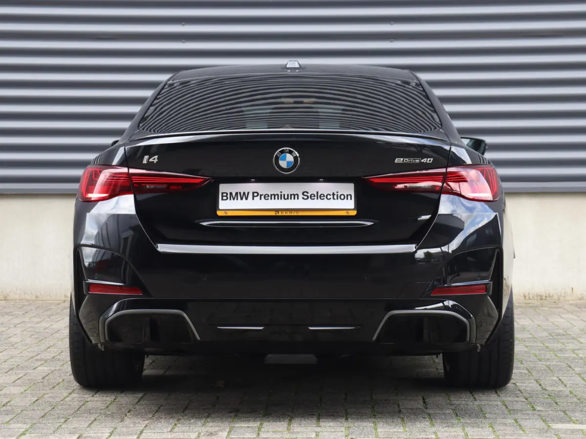 eDrive40 | M Sportpakket Pro | Comfort Access | Getint Glas | Hi-Fi | Adaptive Cruise Control | Laserlight | Stuurwiel Verwarmd | SoH 100% | 19'' LMV