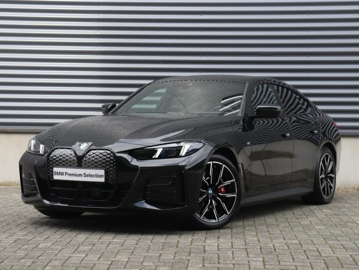eDrive40 | M Sportpakket Pro | Comfort Access | Getint Glas | Hi-Fi | Adaptive Cruise Control | Laserlight | Stuurwiel Verwarmd | SoH 100% | 19'' LMV