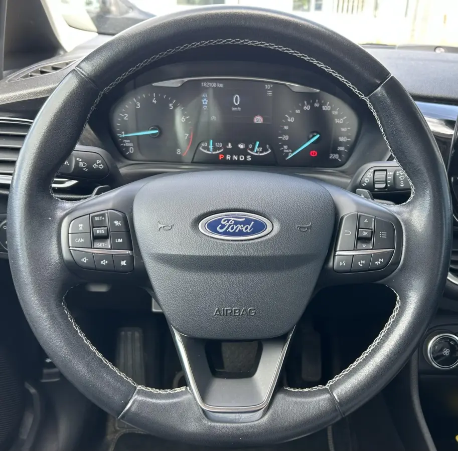 1.0 EcoBoost Titanium 101PK | 1e Eigenaar! | Dealeronderhouden | NL AUTO | AUTOMAAT | Trekhaak | Achteruitrijcamera | B&O Audio | Navigatie | Climate Control | Adaptive Cruise Control | Voor