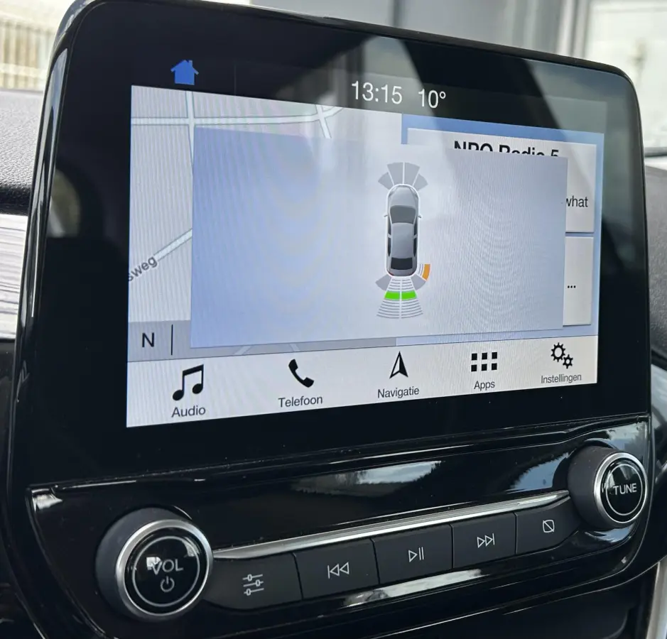 1.0 EcoBoost Titanium 101PK | 1e Eigenaar! | Dealeronderhouden | NL AUTO | AUTOMAAT | Trekhaak | Achteruitrijcamera | B&O Audio | Navigatie | Climate Control | Adaptive Cruise Control | Voor
