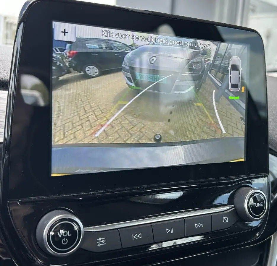 1.0 EcoBoost Titanium 101PK | 1e Eigenaar! | Dealeronderhouden | NL AUTO | AUTOMAAT | Trekhaak | Achteruitrijcamera | B&O Audio | Navigatie | Climate Control | Adaptive Cruise Control | Voor