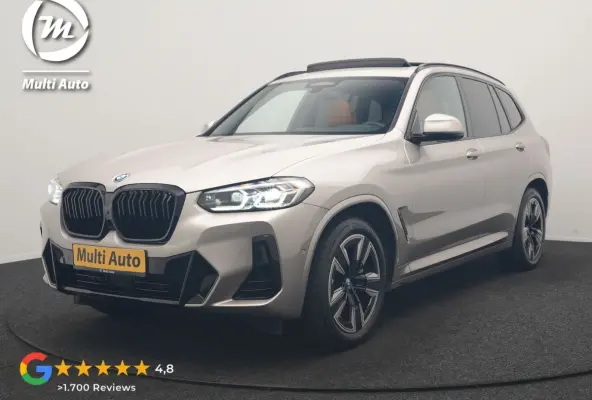 M Sport 80 kWh 286pk Dealer O.H | Panodak | Adaptive Cruise | Camera | Lederen Sportstoelen Memory & Verwarmd | Sfeerverlichting | Blis | Apple Carplay | Navigatie | DAB | 19"L.M