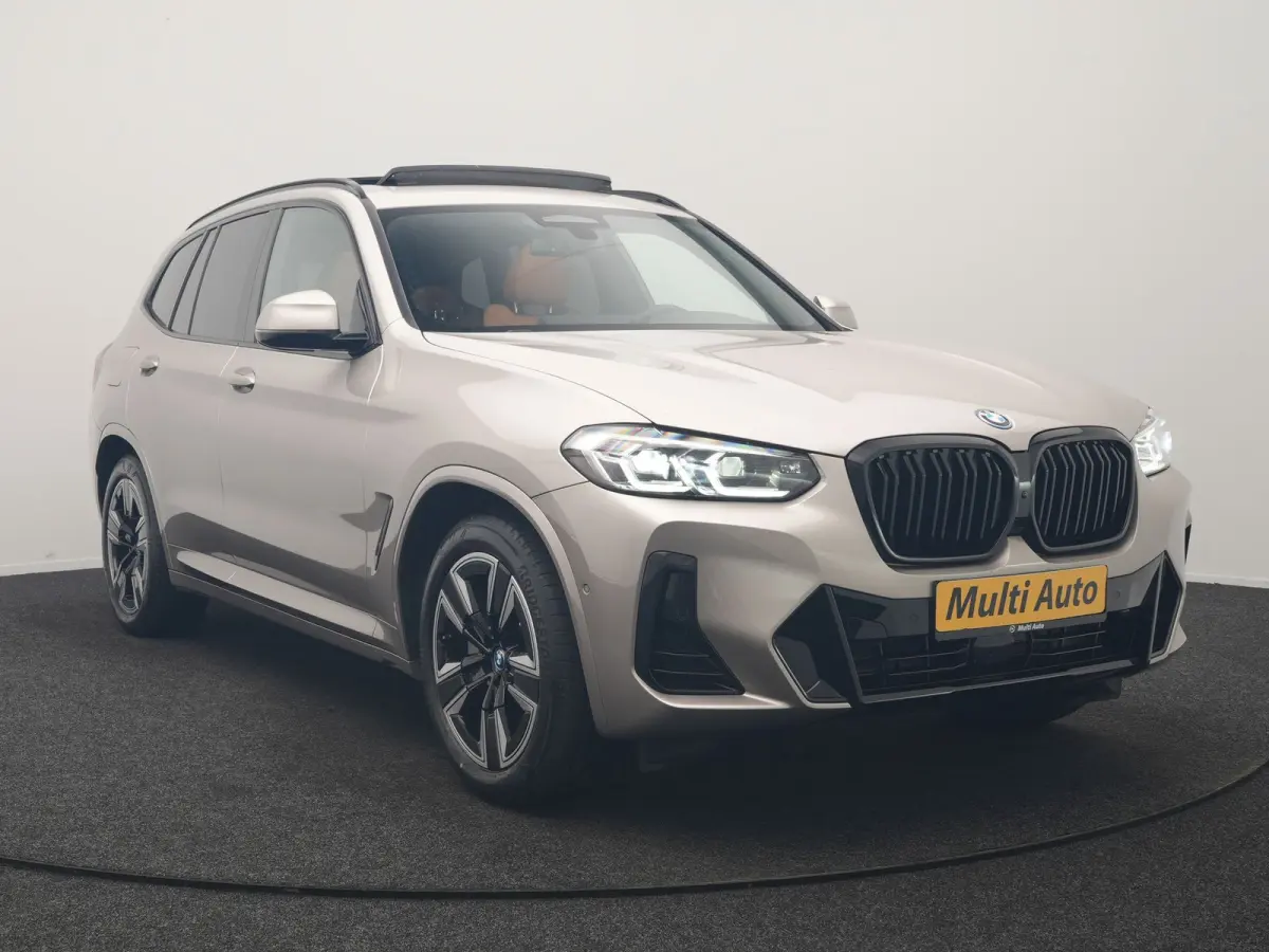 M Sport 80 kWh 286pk Dealer O.H | Panodak | Adaptive Cruise | Camera | Lederen Sportstoelen Memory & Verwarmd | Sfeerverlichting | Blis | Apple Carplay | Navigatie | DAB | 19"L.M