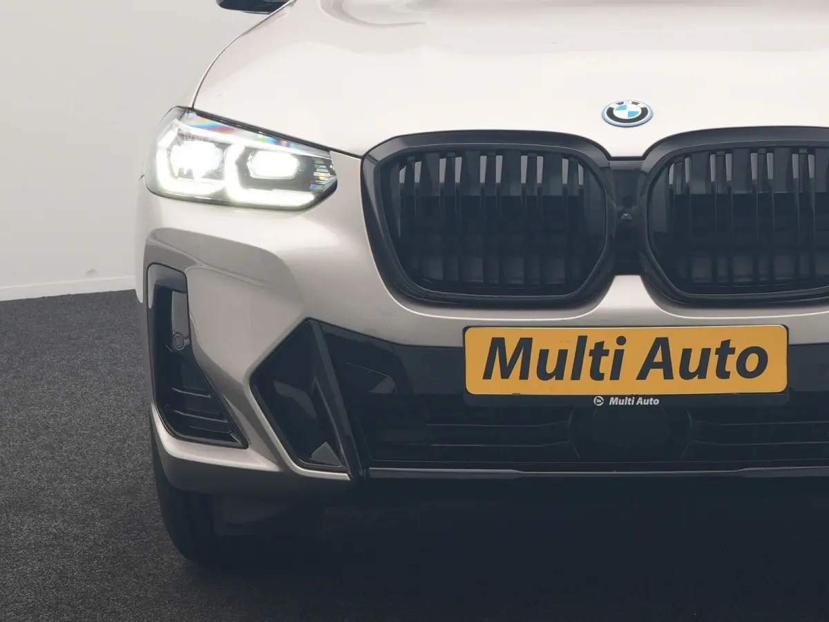M Sport 80 kWh 286pk Dealer O.H | Panodak | Adaptive Cruise | Camera | Lederen Sportstoelen Memory & Verwarmd | Sfeerverlichting | Blis | Apple Carplay | Navigatie | DAB | 19"L.M