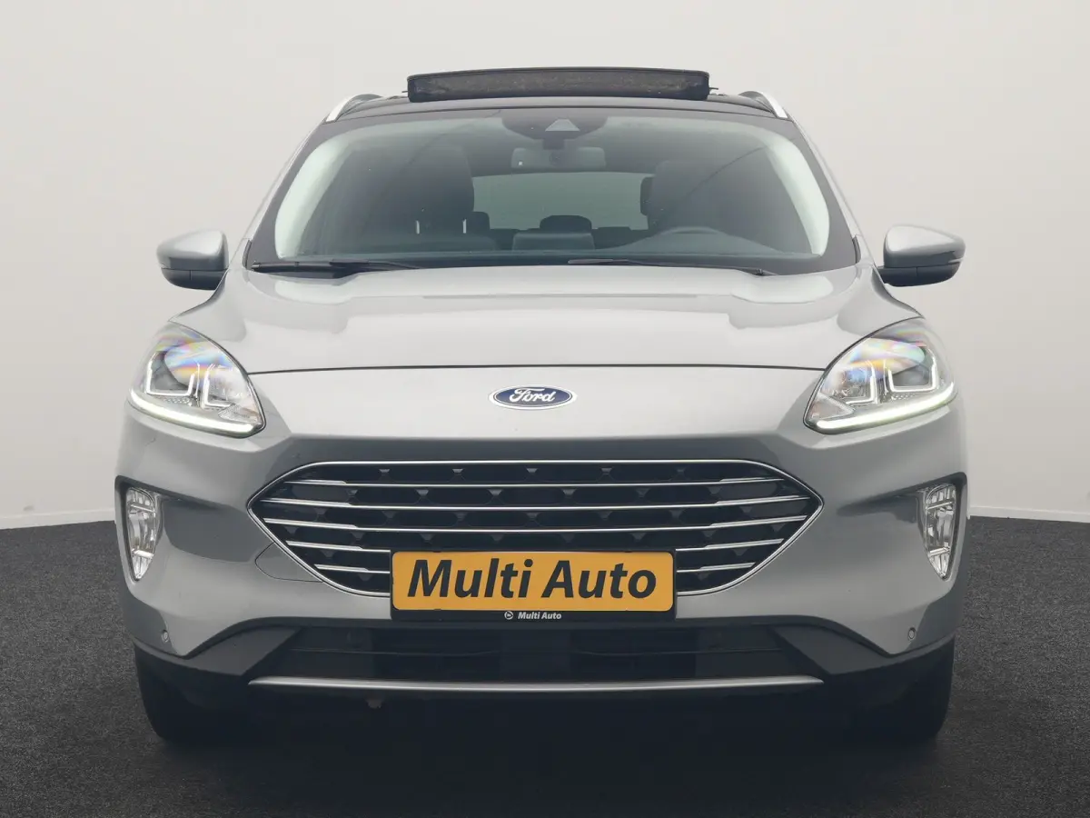 2.5 PHEV Titanium 225pk Dealer O.H. | Trekhaak Afn. | Panodak | Camera | Stoelen & Stuur Verwarmd | Apple Carplay | Keyless | Virtual | Cruise Control | Navigatie | DAB | Plug In Hybrid |