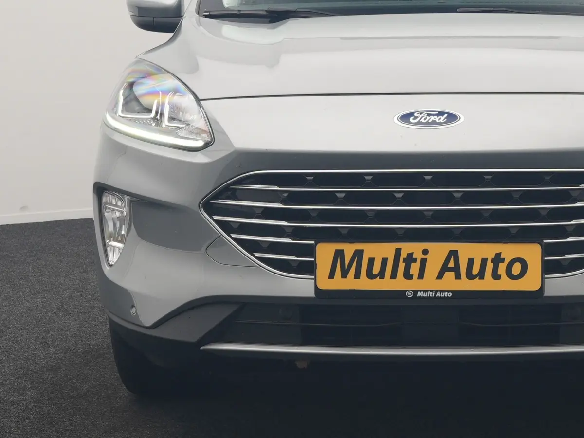 2.5 PHEV Titanium 225pk Dealer O.H. | Trekhaak Afn. | Panodak | Camera | Stoelen & Stuur Verwarmd | Apple Carplay | Keyless | Virtual | Cruise Control | Navigatie | DAB | Plug In Hybrid |