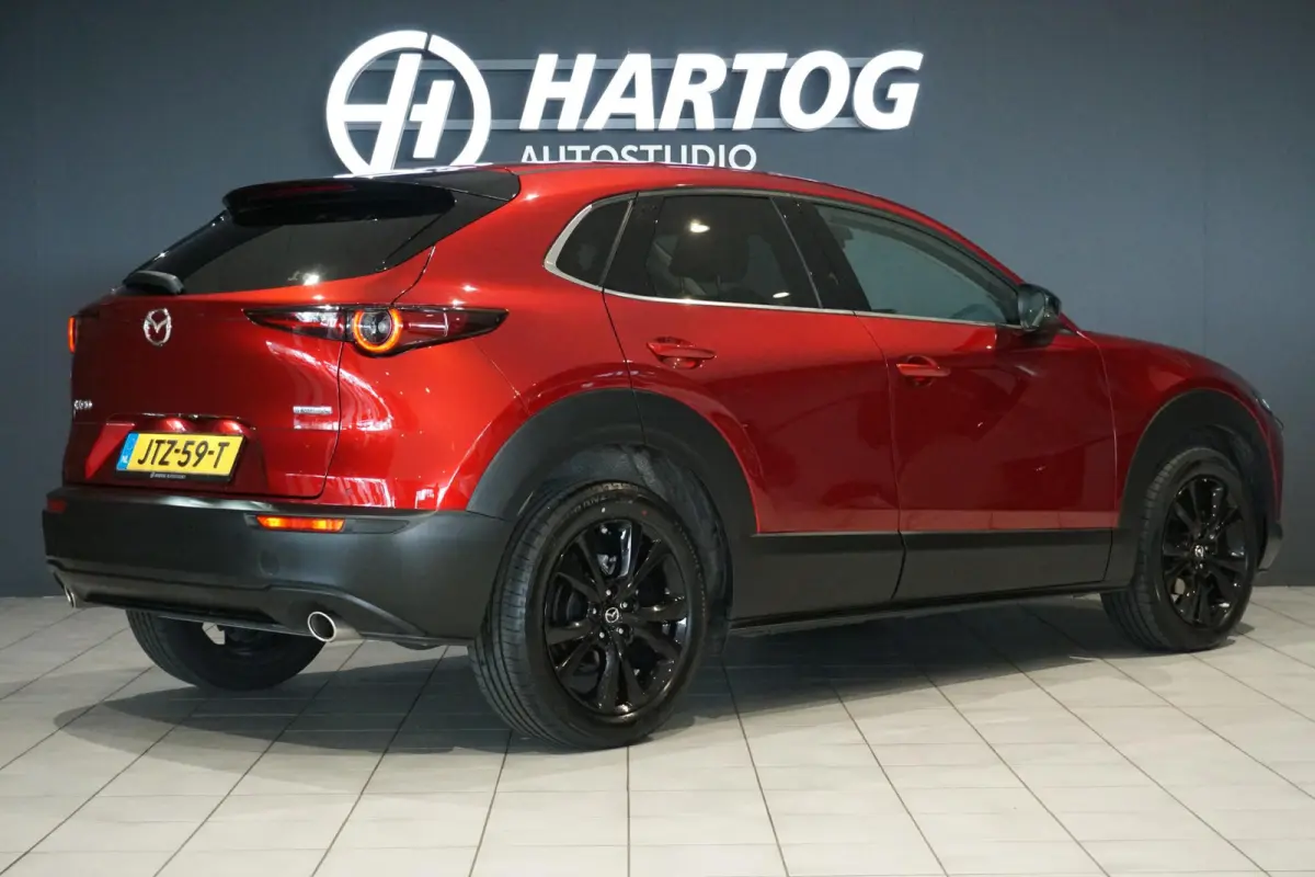 2.5 e-SkyActiv-G M Hybrid Nagisa + HEAD-UP / DODEHOEK / CAMERA / STOELVERWARMING /