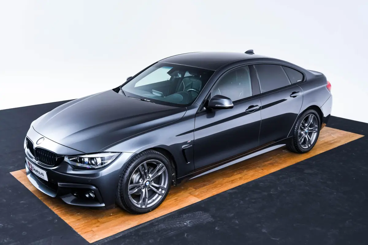 418i M Sport Achteruitrijcamera - Cruise control - Sportstoelen - Elektrisch verwarmde voorstoelen - HiFi System - Navigatiesysteem Professional - PDC voor/achter -