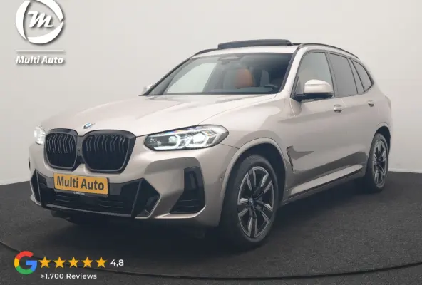 M Sport 80 kWh 286pk Dealer O.H | Panodak | Adaptive Cruise | Camera | Lederen Sportstoelen Memory & Verwarmd | Sfeerverlichting | Blis | Apple Carplay | Navigatie | DAB | 19"L.M