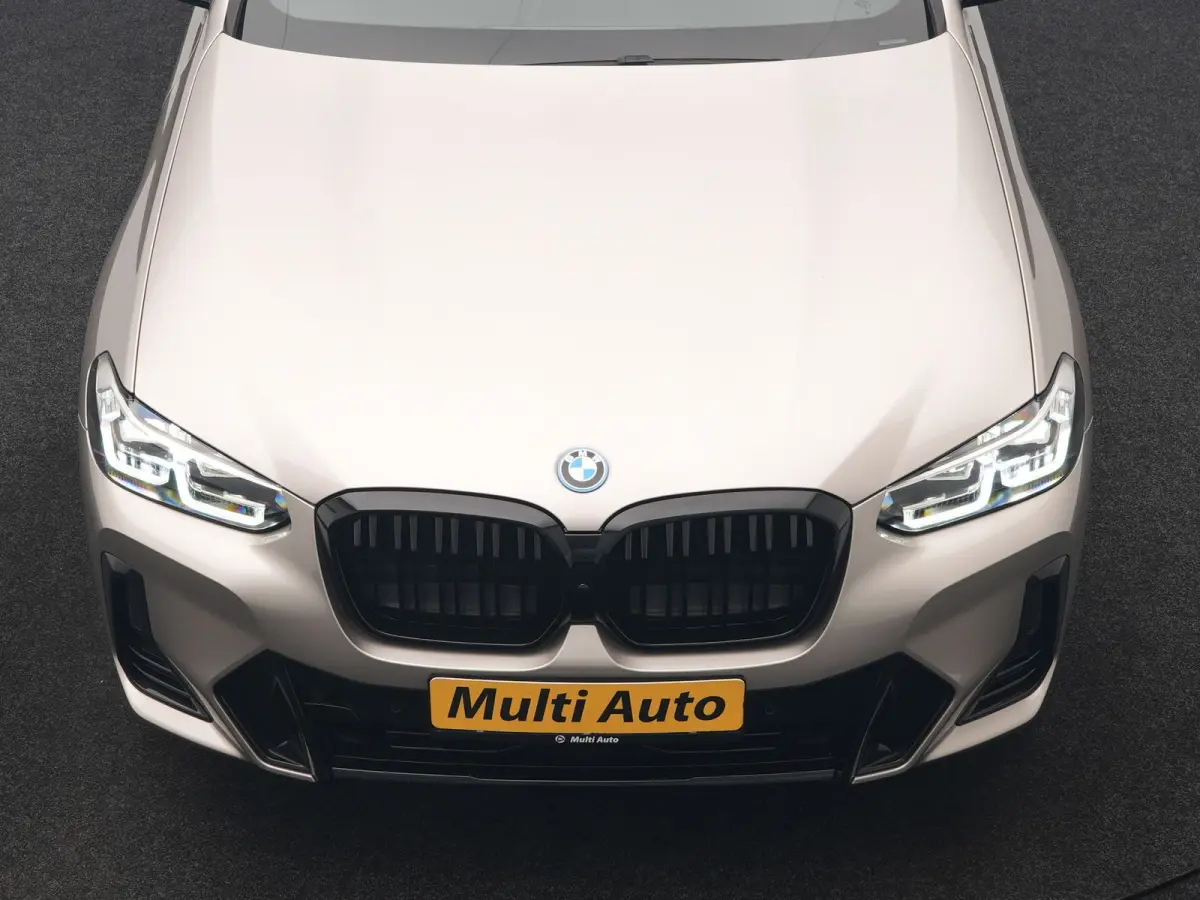M Sport 80 kWh 286pk Dealer O.H | Panodak | Adaptive Cruise | Camera | Lederen Sportstoelen Memory & Verwarmd | Sfeerverlichting | Blis | Apple Carplay | Navigatie | DAB | 19"L.M