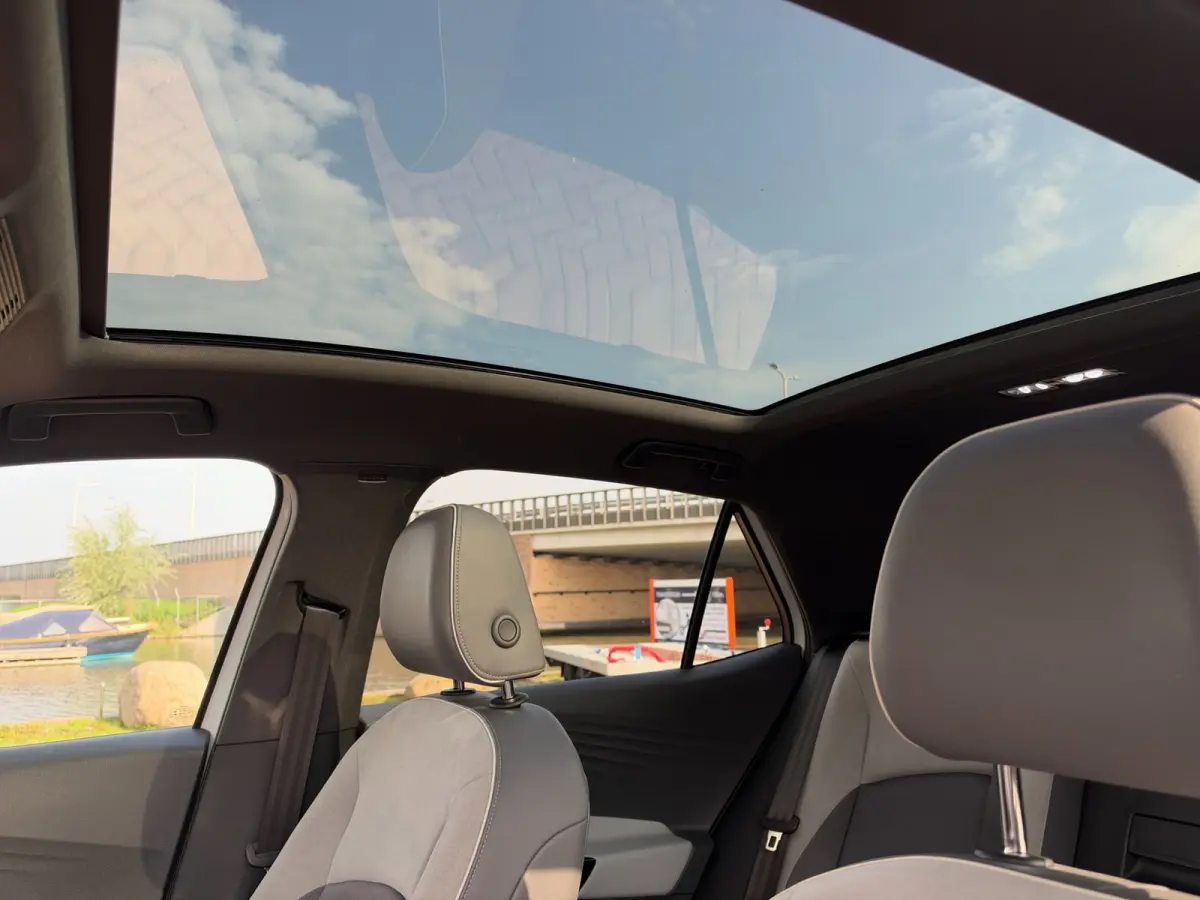 First Max 58 kWh **PANODAK+LANE ASSIST+CAMERA+HEAD UP+MASSAGE STOELEN+CARPLAY**