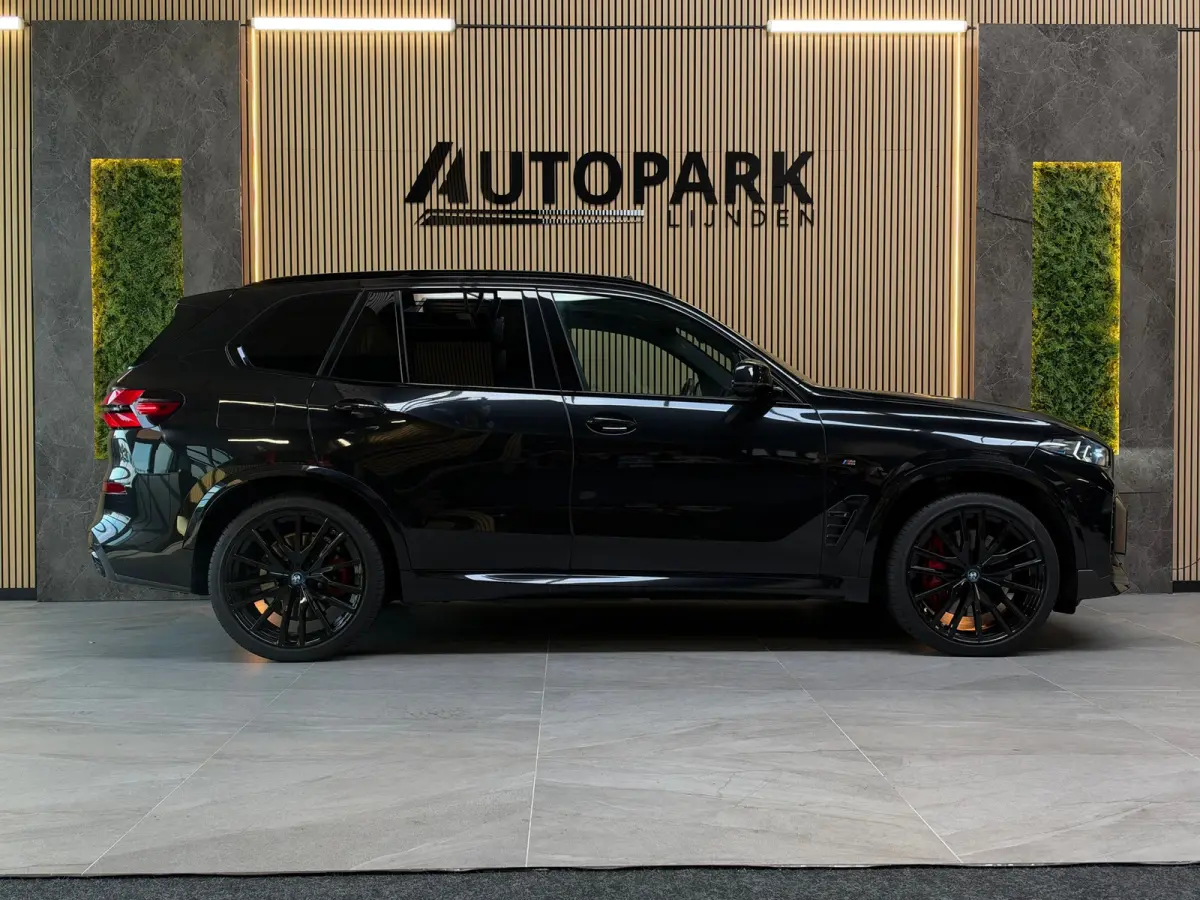 XDrive50e M-SPORT|PANO|H&K|SOFTCLOSE|HuD|360 CAMERA|MEMORY|KEYLESS|TREKHAAK|22INCH|489PK|BOMVOL!