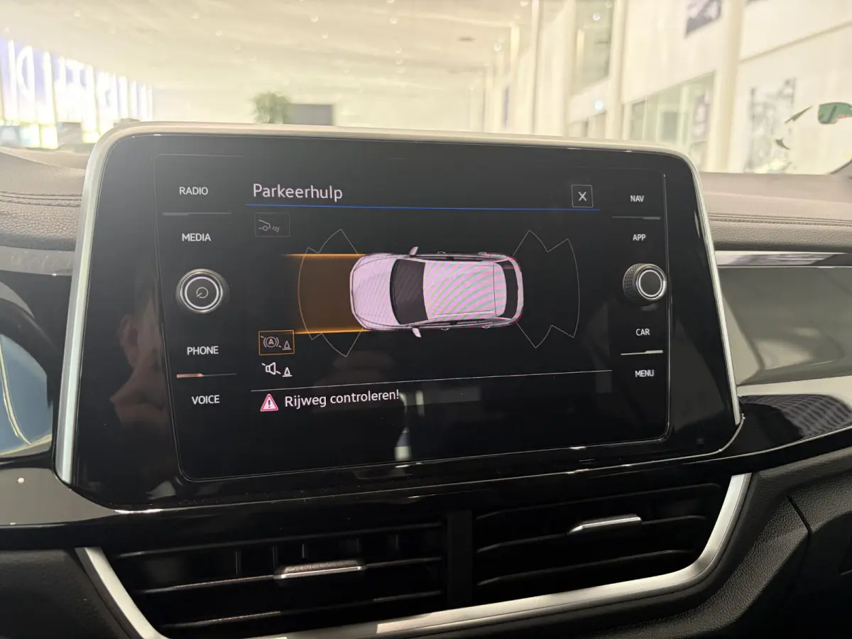1.5 TSI R-Line Business+ | ADAPTIVE CRUISE CONTROL | ACHTERUITRIJCAMERA | TREKHAAK | ELEKTRISCH BEDIENBARE ACHTERKLEP | PANORAMADAK |