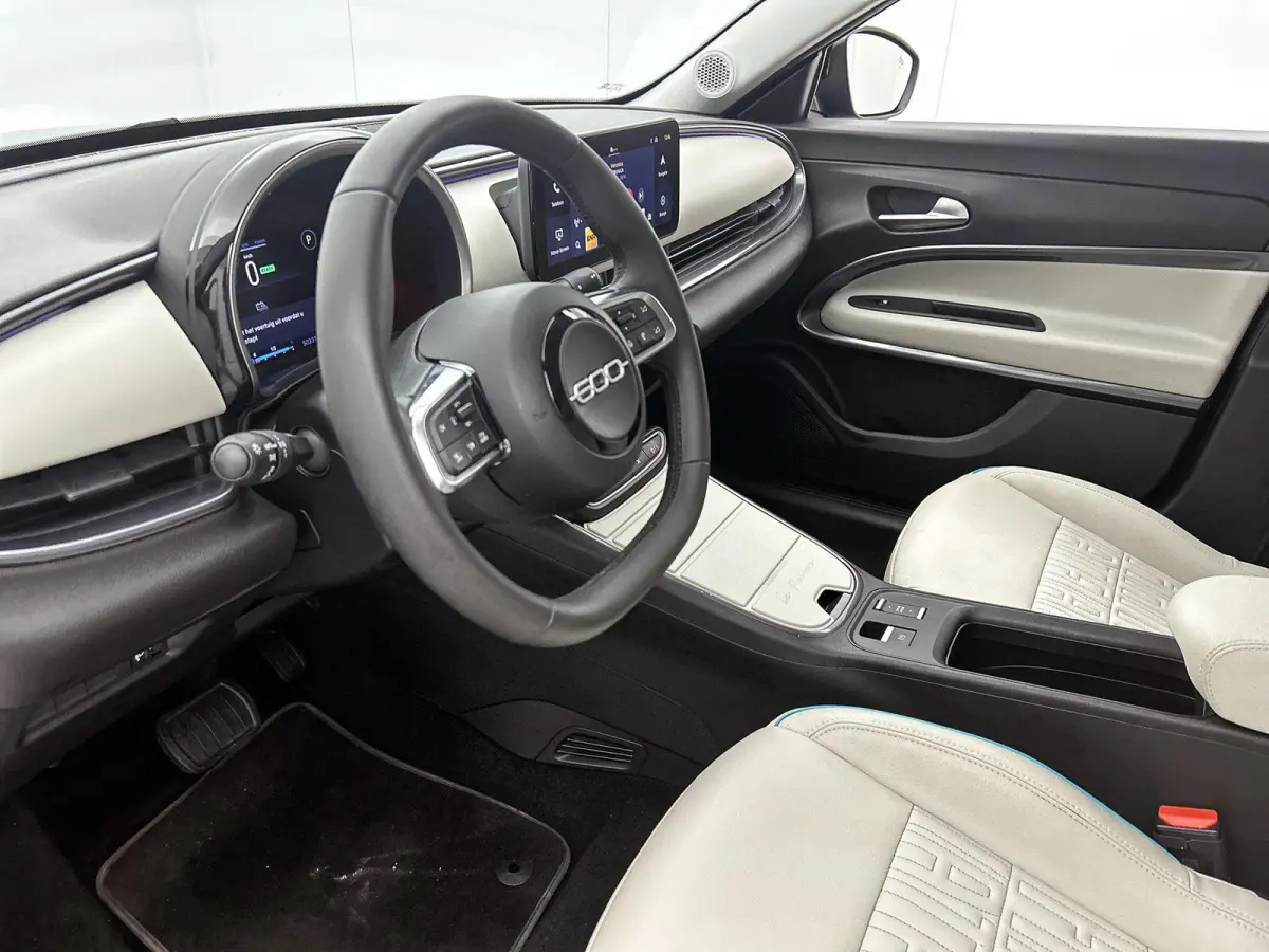 156pk La Prima 54 kWh Automaat ACCU 95% | 3 Fase | Elektrische Achterklep | Elektrische Bestuurdersstoel met Massage | Navigatie | Climate Control | Adaptieve Cruise Control | 18" LMV | Acht