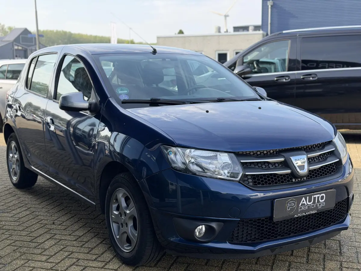 0.9 TCe 10th Anniversary 90PK | 1e Eigenaar | Volledig Dealeronderhouden! | NL AUTO | NAP | Afneembare Trekhaak | Airco | Parkeersensoren | Navigatie | Cruise Control | 2 Sleutels |