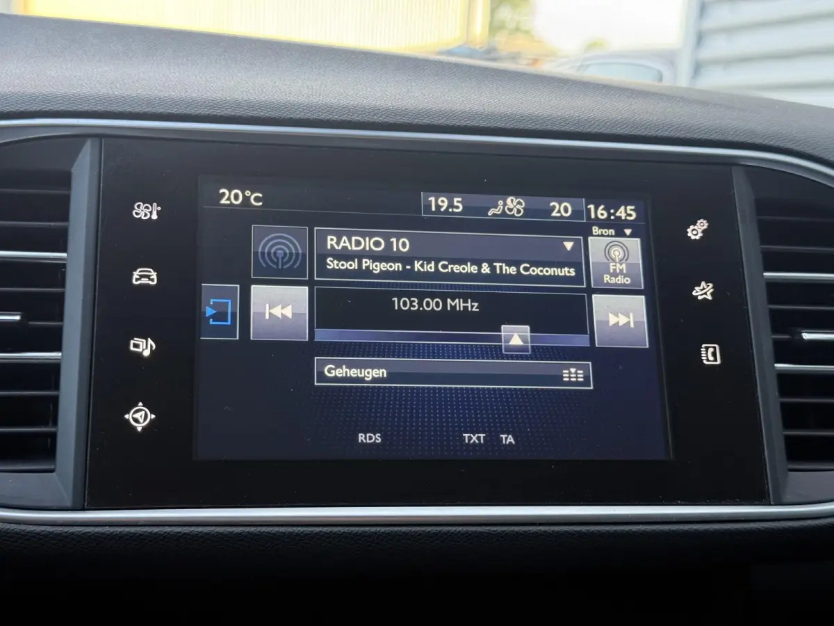 1.2 PureTech Style 2e Eigenaar|Clima|Cruise|Trekhaak|Navi|Elek ramen|Lm velgen|Nieuwe APK bij aflevering